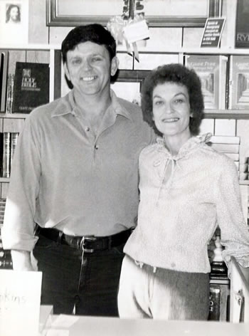 man and woman in a bookstore in the 1980's
