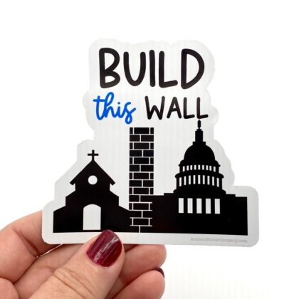 Build This Wall sticker featuring a wall separating a church from a government building to symbolize the separation of church and state