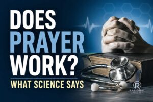 Praying hands resting on a Bible beside a stethoscope with the text "Does Prayer Work? What Science Says," representing scientific research into prayer and healing.