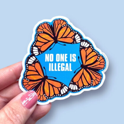 No One Is Illegal vinyl sticker featuring the phrase surrounded by butterflies symbolizing hope, freedom, and compassion