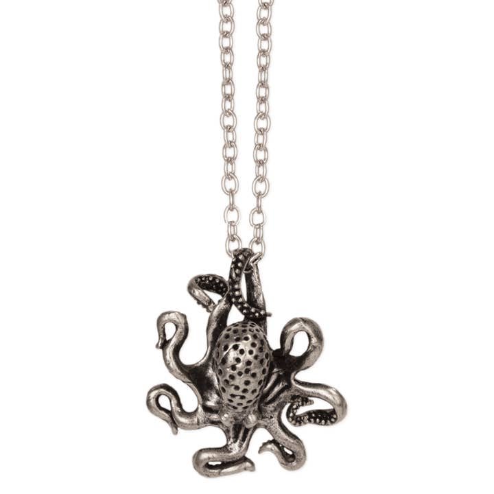 Detailed octopus pendant necklace with curling tentacles and textured suckers hanging from a chain against a white background.