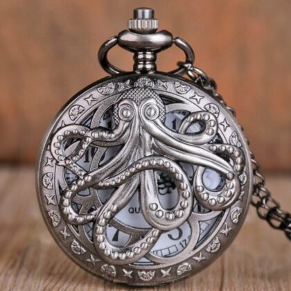 Close-up of the octopus design on a vintage-style silver-tone pocket watch necklace.