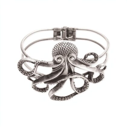 Silver-tone hinged cuff bracelet featuring a large sculpted octopus with outstretched curling tentacles and detailed suction cups against a white background.